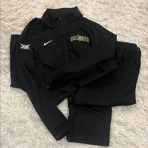 Nike athletic warm up Suit with UCF Orlando logo and Gasparilla Bowl logo